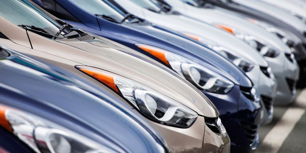Hyundai vehicles lined up in a dealership showing different models and transmission options