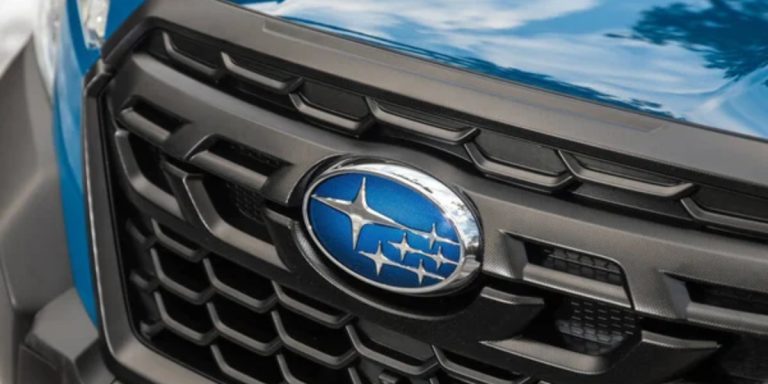 Blue Subaru logo.